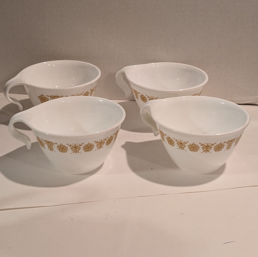 4 Vintage Corelle Livingware coffee or tea cup in the "Butterfly Gold" pattern.
